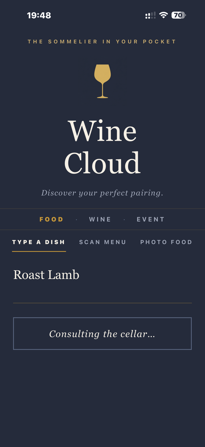 Wine Cloud in Food mode with Roast Lamb typed into the dish field and the button reading Consulting the cellar, with Type a Dish, Scan Menu and Photo Food tabs above.
